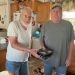 Meals on Wheels consumer James Davis, left, receives meals from delivery driver Bob Rubly at his home in Sanborn, Clearfield County.