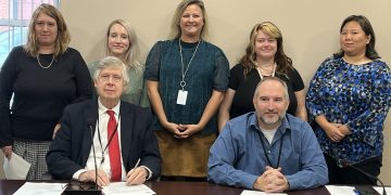 The Clearfield County Commissioners on Tuesday proclaimed November as National Adoption Month at the request of the Children’s Aid Society of Clearfield County. Pictured, from left in the front row, are Commissioners John Sobel and Dave Glass. In the back row are Jennifer Teats, adoption program manager; Brandi Billotte, permanency worker; Amanda Clark, adoption/foster care administrative assistant; Cailyn Leskovansky, permanency worker; and Kate Wood, permanency worker. (Photo by GANT News Editor Jessica Shirey)