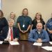 The Clearfield County Commissioners on Tuesday proclaimed November as National Adoption Month at the request of the Children’s Aid Society of Clearfield County. Pictured, from left in the front row, are Commissioners John Sobel and Dave Glass. In the back row are Jennifer Teats, adoption program manager; Brandi Billotte, permanency worker; Amanda Clark, adoption/foster care administrative assistant; Cailyn Leskovansky, permanency worker; and Kate Wood, permanency worker. (Photo by GANT News Editor Jessica Shirey)