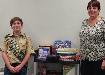Danny Redding, 15, of Curwensville recently donated an activity cart that he completed as his Eagle Scout project to the Adult Day Center in Clearfield. Center Coordinator Julie Fenton, right, accepted the gift, which will provide stimulating activities for seniors who spend time at the center.
