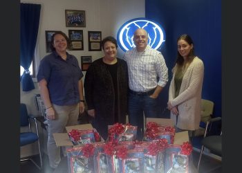 The Hal Beimel Allstate Insurance Office Team in Clearfield presented REST Founder, Bobbie Johnson, with family Christmas bundles for the second-ever Kinship Family Christmas Party.  From, left to right, are Nikki Mallon, Bobbie Johnson, Hal Beimel and Melissa Fannin.