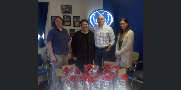 The Hal Beimel Allstate Insurance Office Team in Clearfield presented REST Founder, Bobbie Johnson, with family Christmas bundles for the second-ever Kinship Family Christmas Party.  From, left to right, are Nikki Mallon, Bobbie Johnson, Hal Beimel and Melissa Fannin.