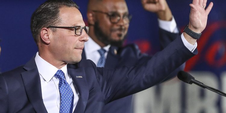 Pennsylvania's next governor Josh Shapiro is joined by future Lt. Gov. Austin Davis after Shapiro’s victory night speech.

Heather Khalifa / Philadelphia Inquirer