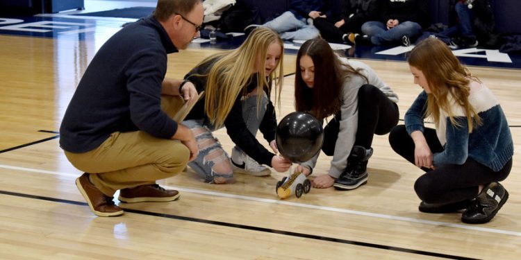 Students prepare to start their vehicle in the distance race at the PAW Center during STEAM Day at Penn State DuBois, under the guidance of Brad Lashinsky, program director for the North Central PA LaunchBox powered by Penn State DuBois.

Credit: Penn State