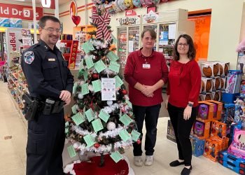 Pictured, from left, are Clearfield Borough Assistant Chief of Police Nathan Curry, Bernice James for Family Dollar Store and Ronda Vaughn, fundraising and events specialist for the MRAAA.
