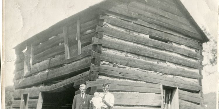 Civil War Veteran Daniel Barnett at left, son Benjamin Barnett and grandson William Barnett pose for photo August 26, 1925, at the site of the "Bloody Knox" cabin that was built in 1861.