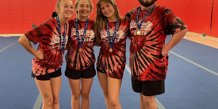 (L-R) Senior, Savannah Ross; Junior, Karissa Fremer; Junior, Samantha Barber; Junior, Trevor Murray. These Brockway Cheerleaders were selected for All-American and will be traveling to Orlando to cheer at this year's Citrus Bowl on January 2, 2023. (Provided Photo).