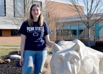 Taylor Charles next to the Nittany Lion shrine on the campus of Penn State DuBois.

Credit: Penn State
