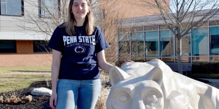 Taylor Charles next to the Nittany Lion shrine on the campus of Penn State DuBois.

Credit: Penn State