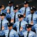Members of the Philadelphia Police Academy Class #395 take the oath to become officers in Philadelphia, Friday, April 8, 2022.

Matt Rourke/AP Photo