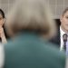 Pennsylvania lawmakers Morgan Cephas (left) and Mark Rozzi (right) listen to a speaker in Philadelphia.

ELIZABETH ROBERTSON / Philadelphia Inquirer