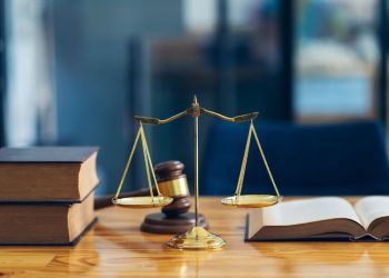 Symbols from the criminal justice system; a scale, a gavel and legal textbooks

Credit: Adobe Stock