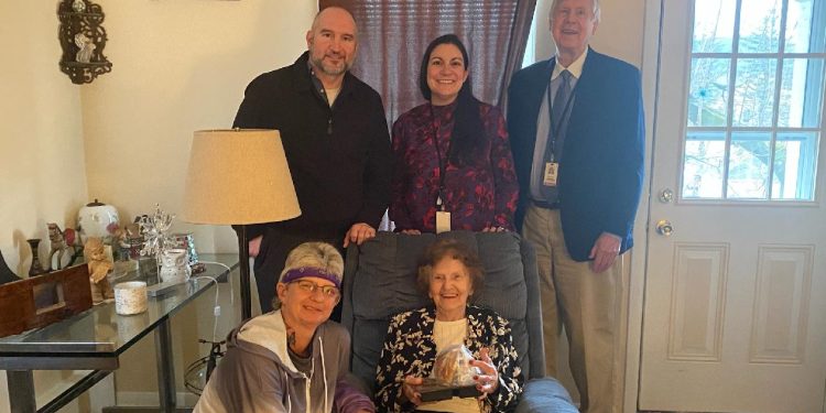 In the bottom row are: Brenda Kruise and Georgia Shomo; in the top row are: Commissioners Dave Glass, Mary Tatum and John Sobel.