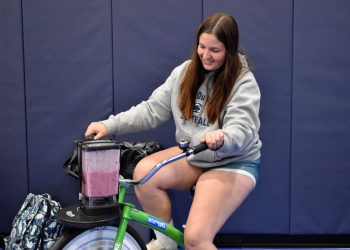 Penn State DuBois sophomore Aleigha Geer pedals the smoothie bike to make her smoothie during the Earth Day celebration at the PAW Center

Credit: Penn State