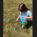 Kimber Butler, daughter of Dan Butler and Morgan McFarland, is shown as she finds eggs and fills her Easter bag.