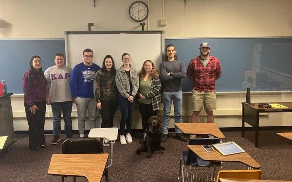 Shown are Dr. Mary Tatum and “Kirby” with Lock Haven students, Sutton Thompson, Cory Johnston, Audra Newmeyer, Madylin Lockhart, Cassandra Merrill, Sean Kershner and Zane Gee.