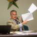Commissioner Scott North displays an audit received by PAGO to the attendees of the meeting. (ExploreJeffersonPA)