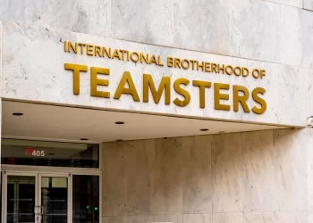 Sign of International Brotherhood of Teamsters at the entrance of its office in Washington

Shutterstock.com