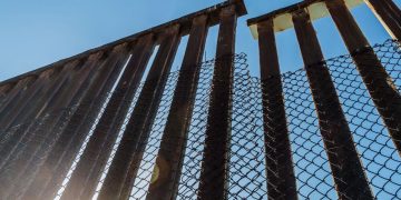 A section of the border fence separating San Diego, California and Tijuana, Mexico.

Sherry V Smith / Shutterstock