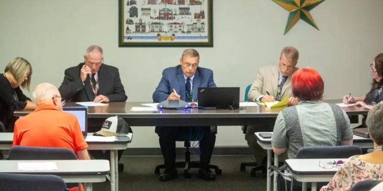 Commissioners Jeffrey Pisarcik, Herbert L. Bullers Jr., and Scott North during the June 27 commissioners meeting. (Explore Jefferson).