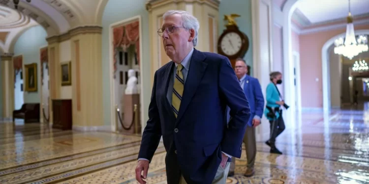 Senate Minority Leader Mitch McConnell, R-Ky., walks to the chamber for final votes before the Memorial Day recess, at the Capitol in Washington, Friday, May 28, 2021. 

J. Scott Applewhite / AP Photo