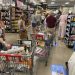 In this Thursday, Aug. 25, 2022, photograph, shoppers queue up in long lines to check out of a King Soopers grocery store in southeast Denver. 

AP Photo/David Zalubowski
