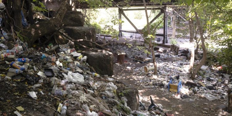 Trash, including discarded syringes and other rubbish, in an open-air heroin market that has thrived for decades, slated for cleanup along train tracks a few miles outside the heart of Philadelphia. 

Matt Rourke | AP Photo