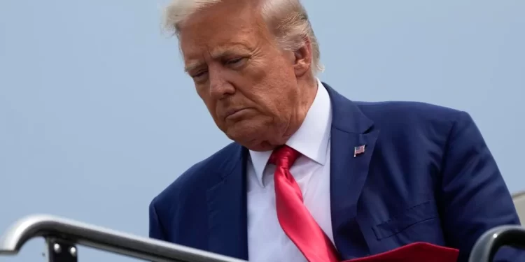 Former President Donald Trump arrives at Ronald Reagan Washington National Airport, Thursday, Aug. 3, 2023, in Arlington, Va., as he heads to Washington to face a judge on federal conspiracy charges alleging Trump conspired to subvert the 2020 election.

Alex Brandon | AP