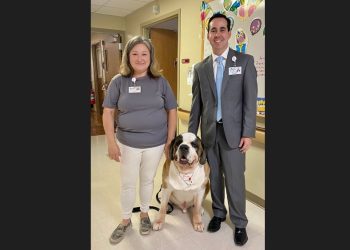 Drago is shown at Penn Highlands DuBois with his owner, Amy Zeiders, and Will Chinn, President of Penn Highlands DuBois.