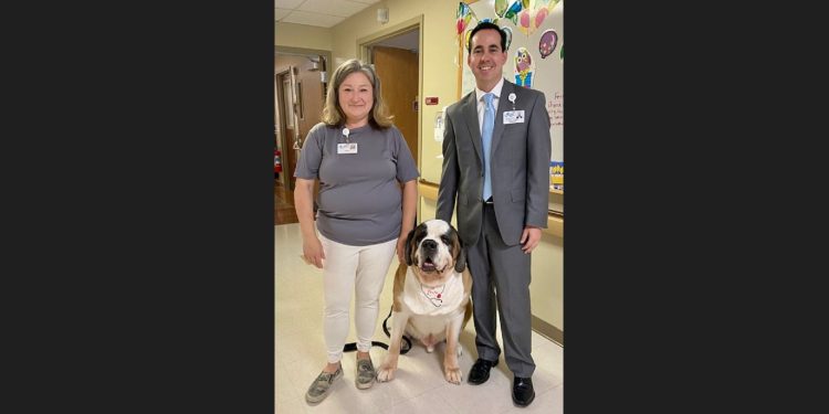 Drago is shown at Penn Highlands DuBois with his owner, Amy Zeiders, and Will Chinn, President of Penn Highlands DuBois.