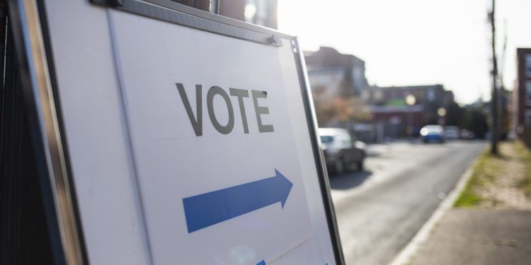 A sign showing people where they should cast their ballots for an election.

Amanda Berg / For Spotlight PA