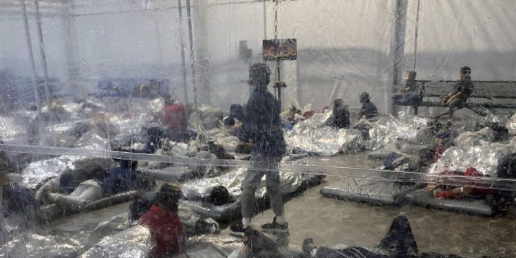 This March 20, 2021, photo provided by the Office of Rep. Henry Cuellar, D-Texas, shows detainees in a Customs and Border Protection (CBP) temporary overflow facility in Donna, Texas. President Joe Biden's administration faces mounting criticism for refusing to allow outside observers into facilities where it is detaining thousands of immigrant children.

Photo courtesy of the Office of Rep. Henry Cuellar via AP