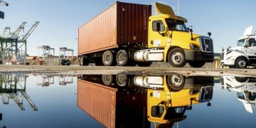 FILE - A truck departs from a Port of Oakland shipping terminal on Nov. 10, 2021, in Oakland, Calif. On Friday, April 28, 2023, California regulators voted to end the sale of new diesel-powered big rigs and buses in the state by 2036. (AP Photo/Noah Berger, File)

Noah Berger / AP Photo