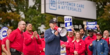 President Joe Biden addresses UAW members walking a picket line at the GM Willow Run Distribution Center on Tuesday in Belleville, Michigan. 

Adam Schultz | The White House