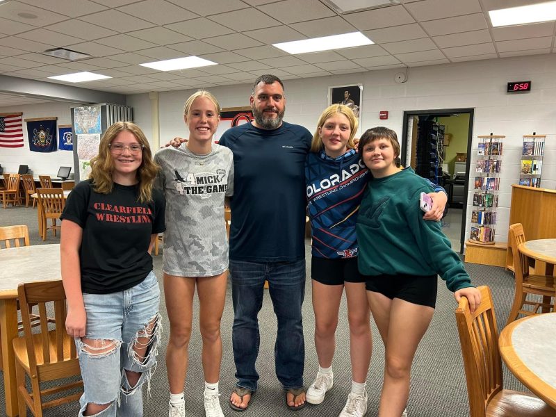 Tim Taylor and members of Clearfield Lady Bison Wresting team
