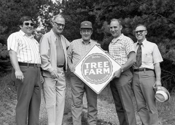 In September of 1974, the award for National Tree Grower was presented, and pictured from left to right, are Bob Clark, director of PA Forestry Association; W.G. "Turk" Jones, a member of the PA Tree Farm Commission and a former Top Tree Farmer of the Year; Wilbur Wolf, chairman of the PA Tree Farm Commission; Ben Lingle; Maurice Hobaugh, assistant district forester of Moshannon State Forest; and Edward Ferrand, extension forester with the Cooperation Extension Service of the Penn State University.