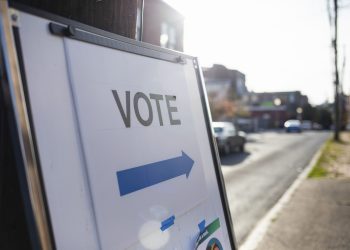 A sign showing people where they should cast their ballots for an election.

Amanda Berg / For Spotlight PA
