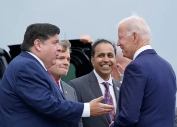 President Joe Biden greets Illinois Gov. J.B. Pritzker, from left, Rep. Mike Quigley, D-Ill., and Rep. Raja Krishnamoorthi, D-Ill., at O'Hare International Airport in Chicago, Thursday, Oct. 7, 2021. 

AP Photo/Susan Walsh