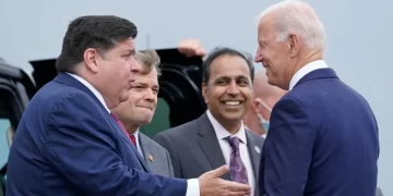 President Joe Biden greets Illinois Gov. J.B. Pritzker, from left, Rep. Mike Quigley, D-Ill., and Rep. Raja Krishnamoorthi, D-Ill., at O'Hare International Airport in Chicago, Thursday, Oct. 7, 2021. 

AP Photo/Susan Walsh