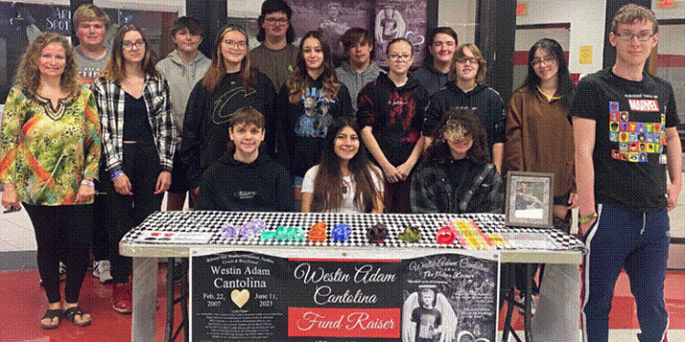 Pictured are family and friends of Westin Cantolina selling merchandise to start the Be the Kindness Fund in Memory of Westin Cantolina.  Front Row: Ethan Turner, Sierra Sones, Serenity Taylor, and  (standing) Lee Ogden, 2nd Row: Danae Cantolina, Zylah Hockenberry, Gabriella Baum, Emma Sones, Kalysta Hunter, Haley Swoope, Skylar Wallace, and 3rd Row: Cole Walker Spencer, Dakota Drexler, Reese Benton, Tucker Campbell, Jacob Swartz