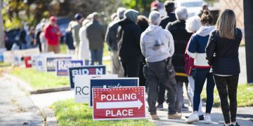 Voters stand in line outside a Pennsylvania polling place.

Amanda Berg / For Spotlight PA