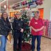 Giving Tree participants kicked off the 2023 season at Family Dollar in Clearfield.  Pictured, left to right, are Christina Shaffer, owner of New Image Tattoo Studio; Julie Curry, assistant chief, Clearfield Regional Police; and Bernice James, manager of Family Dollar.