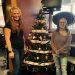 New Image Tattoo Studio staff member Jess Hoyt, left, and owner Chris Shaffer, have put up their fundraising Christmas Tree at the studio in support of MRAAA.