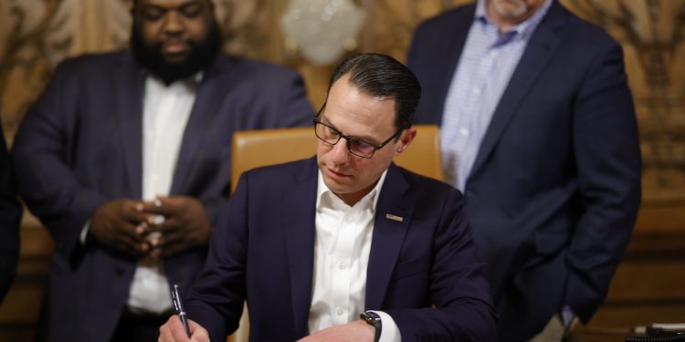 Gov. Josh Shapiro signs the final pieces of the 2023 Pennsylvania budget in the Capitol.

Commonwealth Media Services