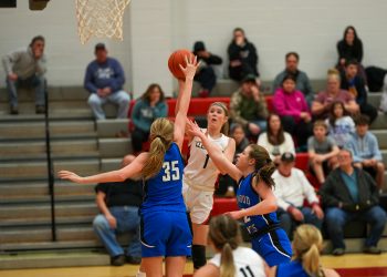 Sonny Diehl (1) has her shot blocked by Lilly Gerwert (35) in the first half.  Photo by Kevin Albertson.