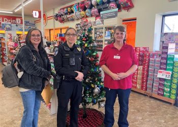 Giving Tree participants at one of the tree locations, Family Dollar in Clearfield.  Pictured, left to right, are Christina Shaffer, owner of New Image Tattoo Studio; Julie Curry, assistant chief, Clearfield Regional Police; and Bernice James, manager of Family Dollar.