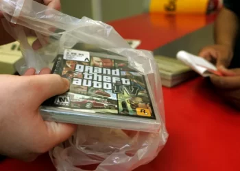 In this April 29, 2008 file photo, a clerk bags a copy of Grand Theft Auto IV at a Circuit City store in Los Angeles. Grand Theft Auto IV raked in more than $500 million in its first week in stores, selling more than 6 million units worldwide, said the video game's publisher, Take-Two Interactive Software Inc., on Wednesday, May 7, 2008. 

AP Photo/Reed Saxon
