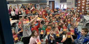 Third graders at Clearfield Elementary School recently received their own dictionaries from members of the Clearfield Area Rotary Club, Chinklacomoose Chapter, and representatives from Mature Resources, through the Rotary Dictionary Project.