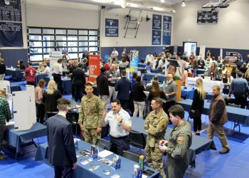 A full gym floor at the PAW Center, with the floor being full of employers, students, alumni and community members during the career fair.

Credit: Penn State