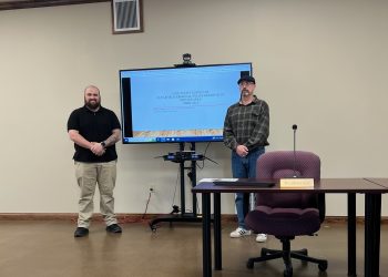 Commonwealth University-Clearfield student, Carl Dawes (left), and faculty member, Dr. Michael J. McSkimming present recent survey results gauging citizen satisfaction of police services.: